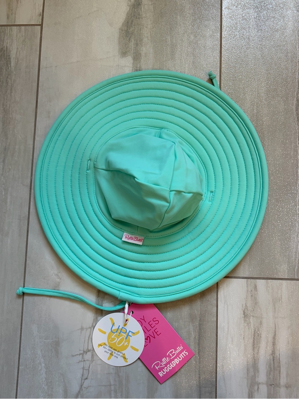 NWT RuffleButts Infant Aqua Wide Brim Sun & Swim Hat with Chin Tie, 0-12 months